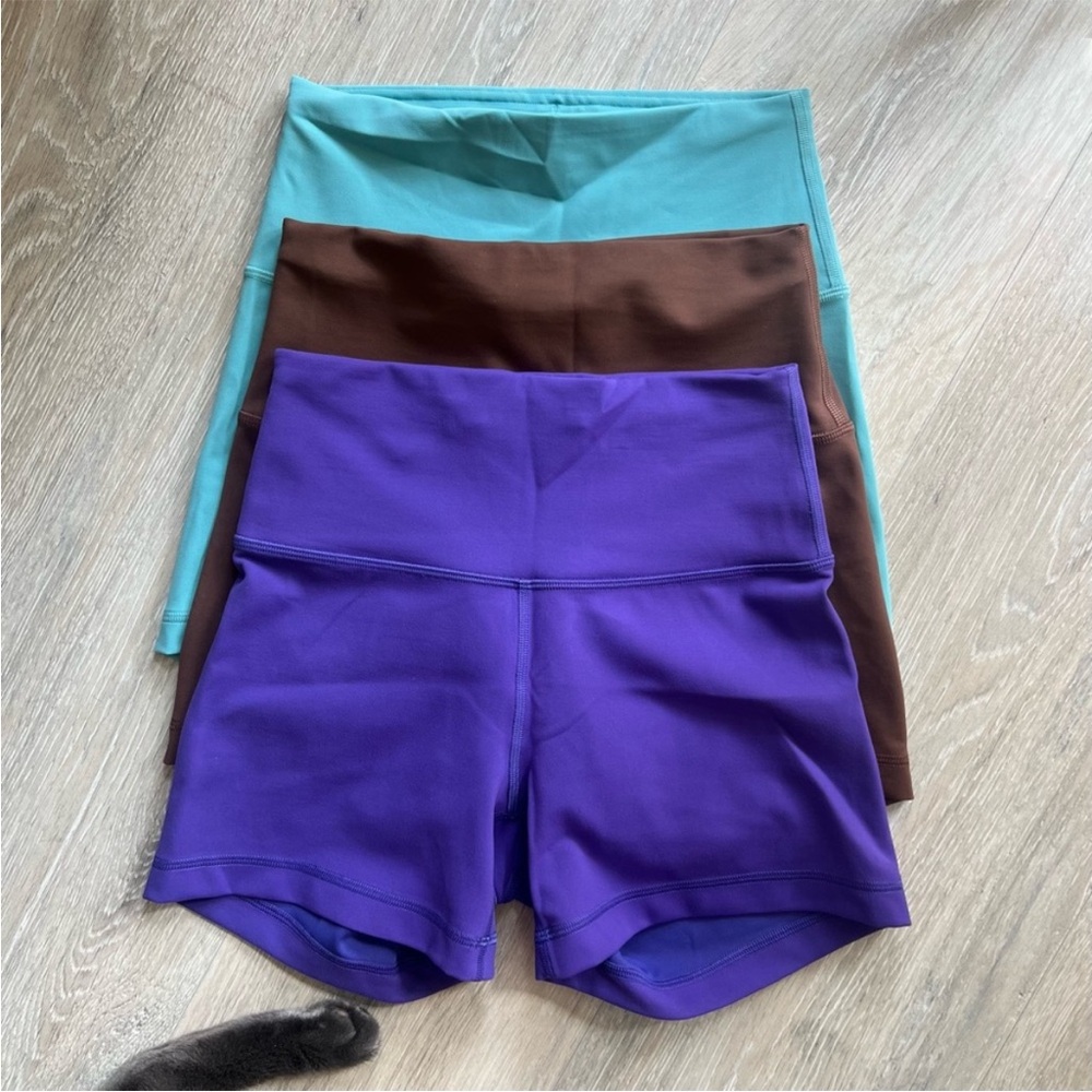 Lululemon 4in Wunder Train shorts  - Purple, Brown, and Teal